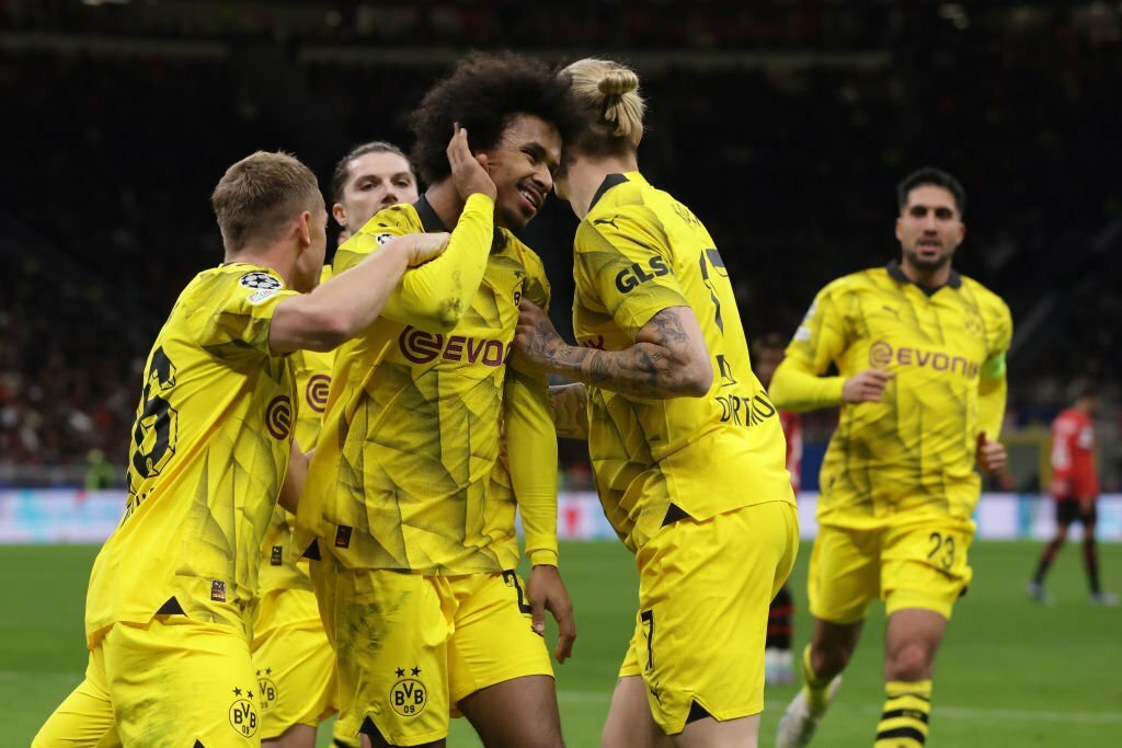 ucl:-dortmund-beat-ac-milan-to-book-last-16-slot